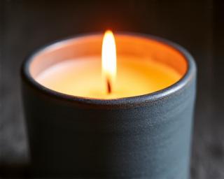 Soy wax candle in a stoneware vessel